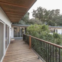 mid-century-natural-light-home-with-hillside-view-43