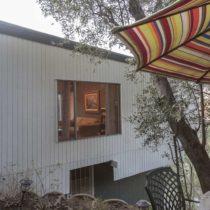 mid-century-natural-light-home-with-hillside-view-55